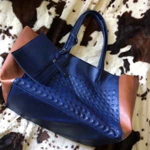 Blue and tan faux leather bag